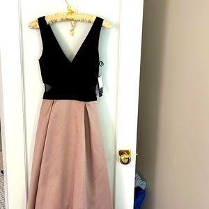 Tags still on from Bloomingdales. Aqua dresses. Black/blush gown. Never worn